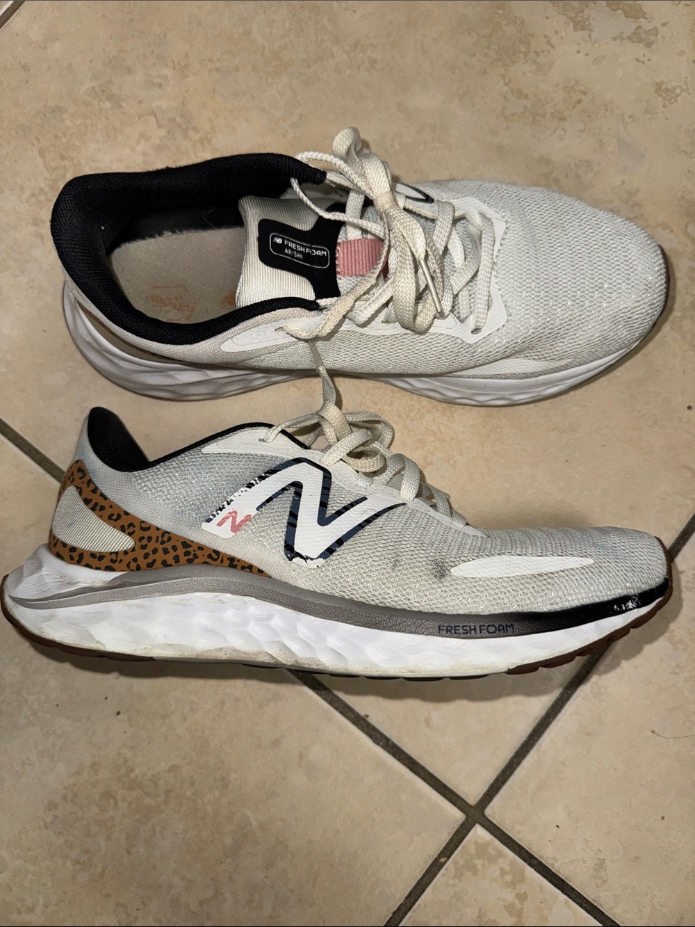 New Balance women’s  White Athletic Shoes with Leopard Heel Accent